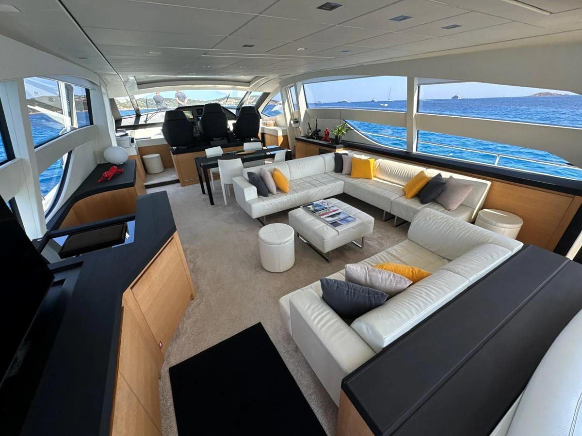 The salon offers a spacious and luxurious seating area with panoramic ocean views. aboard THYKE III Yacht for Sale