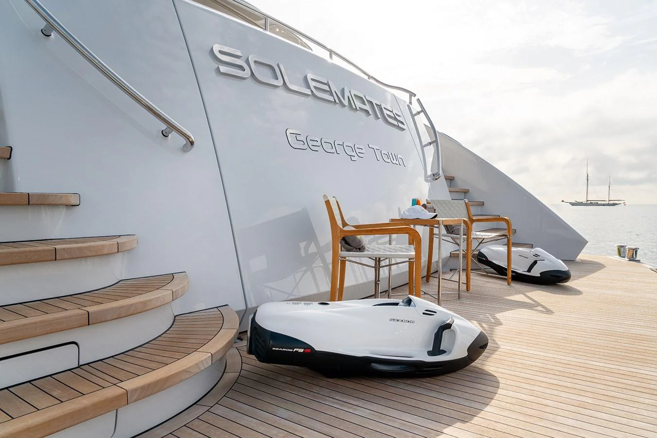 The aft deck features sleek water toys and a stylish seating area, perfect for relaxation and fun. aboard SOLEMATES Yacht for Sale
