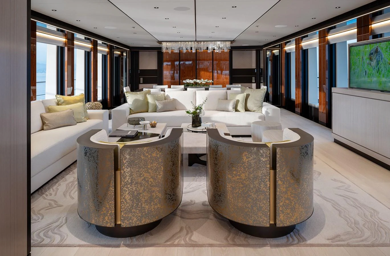 The yacht's salon features luxurious seating and elegant decor, perfect for relaxation and entertainment. aboard SOLEMATES Yacht for Sale
