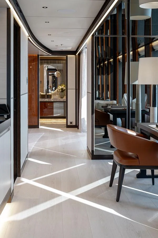 The yacht's interior hallway features modern design with sleek lines and luxurious finishes. aboard SOLEMATES Yacht for Sale