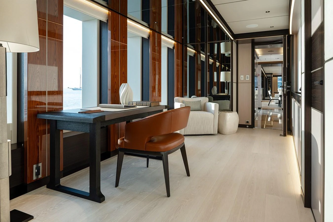A luxurious interior space featuring elegant furnishings and a serene ambiance. aboard SOLEMATES Yacht for Sale