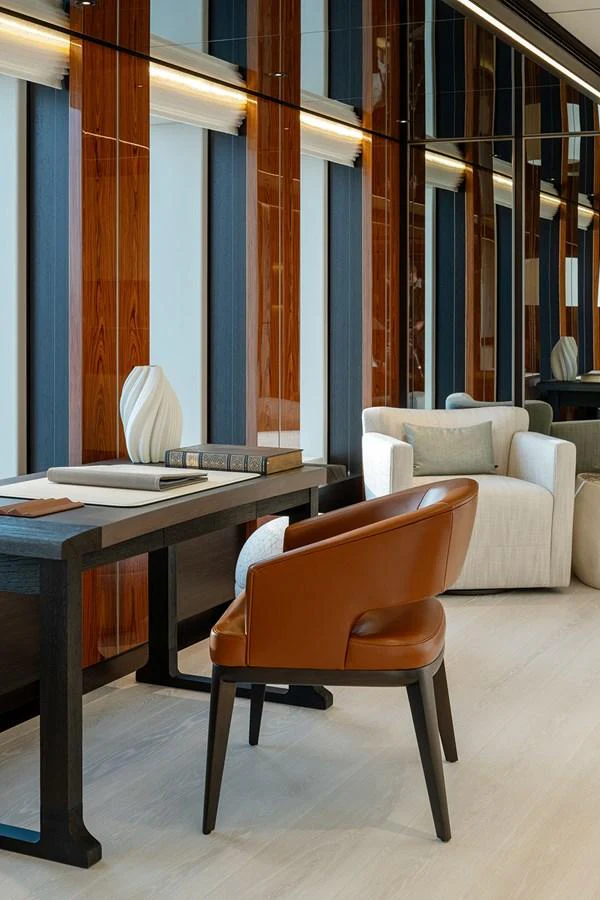A sophisticated study area with elegant furnishings and a serene ambiance. aboard SOLEMATES Yacht for Sale