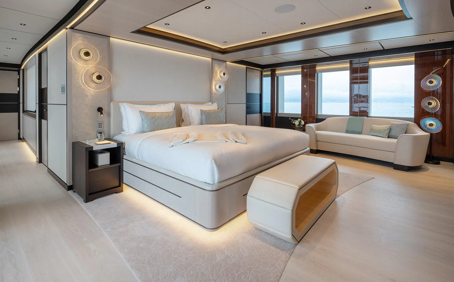 The master stateroom exudes luxury with its spacious layout, modern furnishings, and large windows offering stunning views. aboard SOLEMATES Yacht for Sale