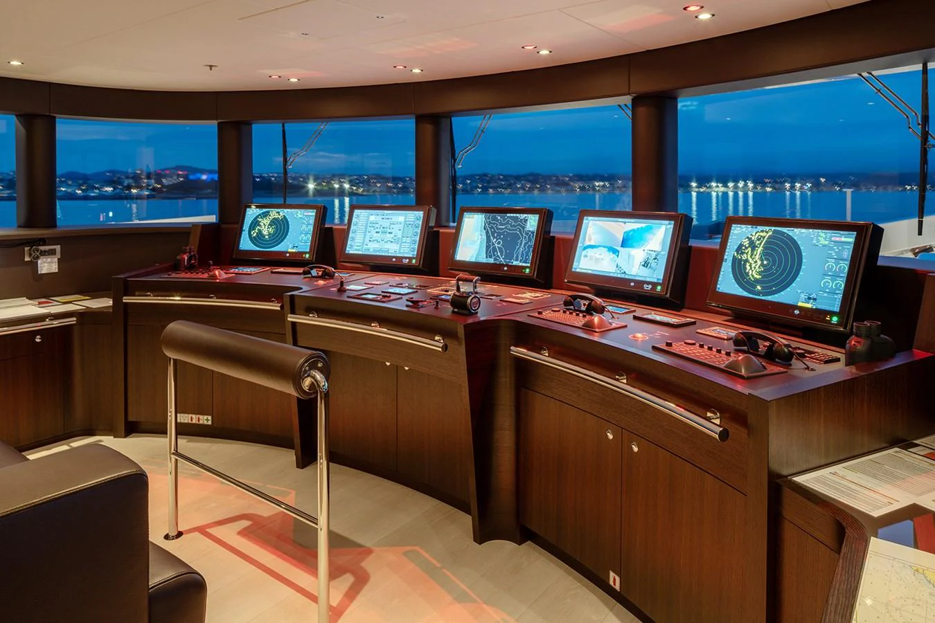 The helm station features an array of advanced navigation and control systems with panoramic views. aboard SOLEMATES Yacht for Sale