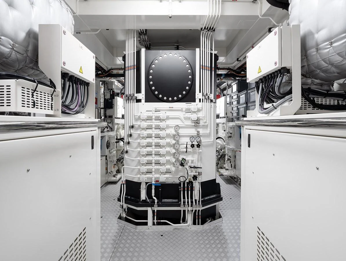 The yacht's engine room showcases a pristine and well-organized layout with advanced machinery. aboard SOLEMATES Yacht for Sale