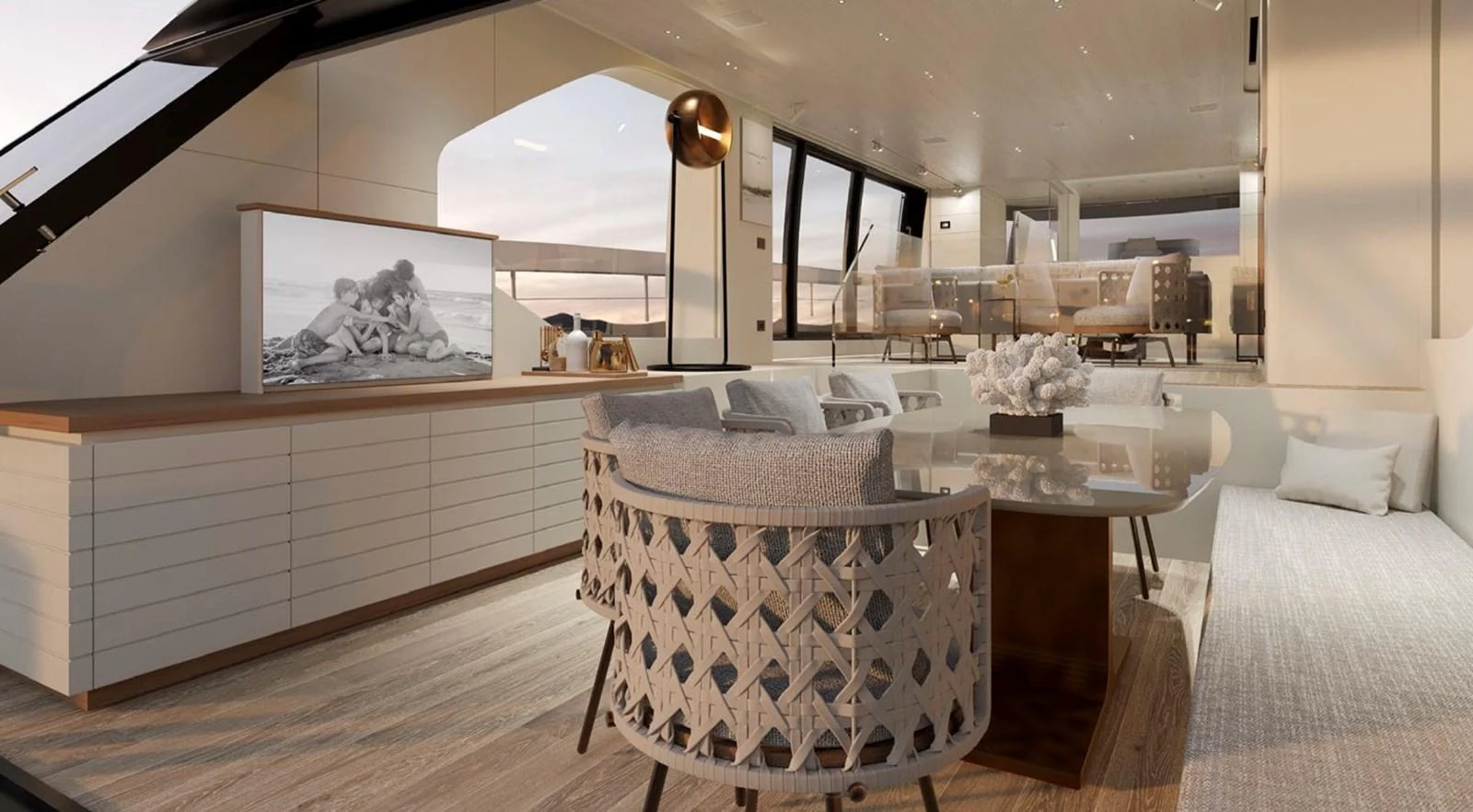 The yacht's interior features a stylish and comfortable seating area with modern decor and ample natural light. aboard SP92 Yacht for Sale