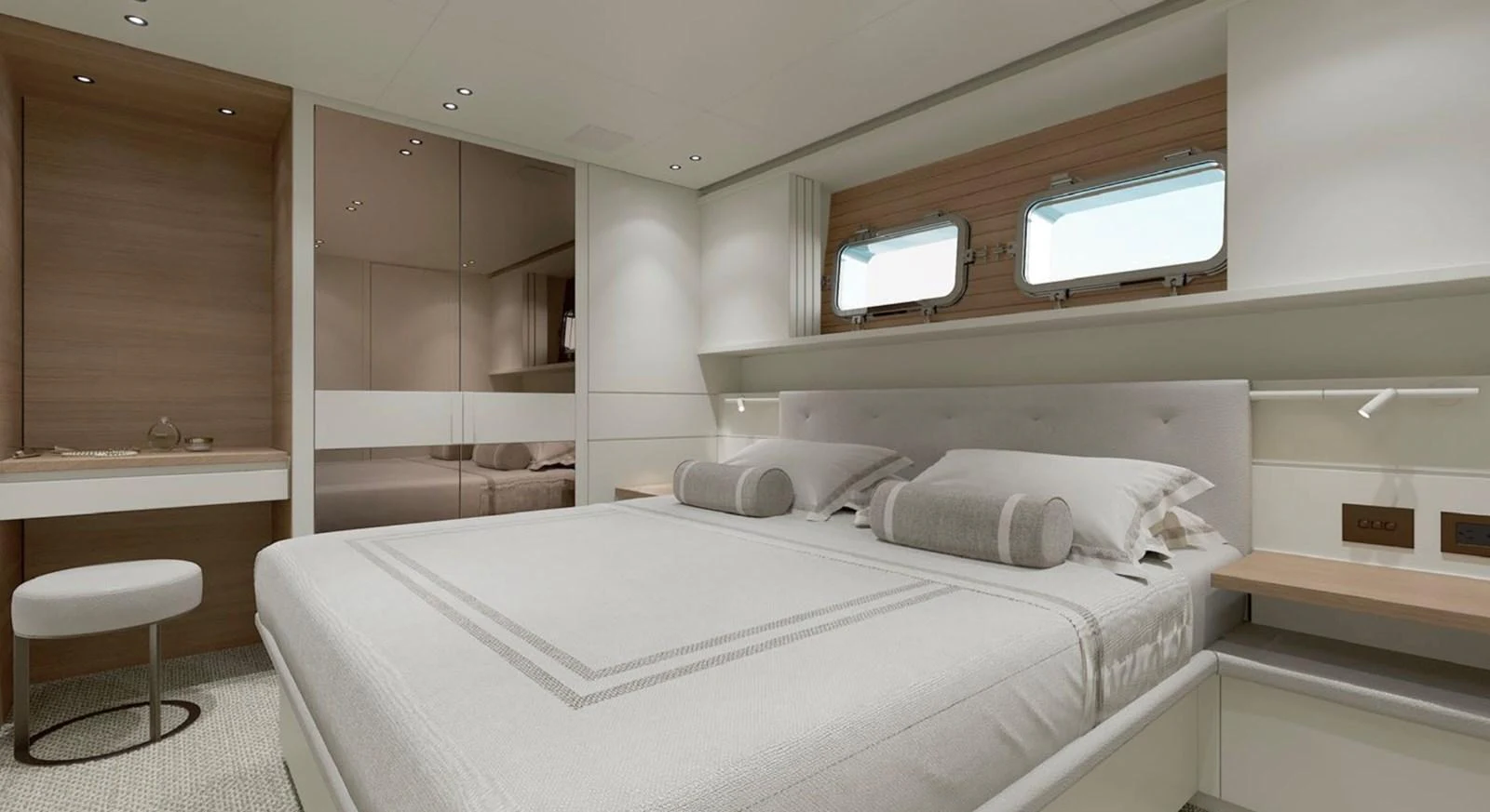 The stateroom features a luxurious bed with elegant linens and ample natural light from the windows. aboard SP92 Yacht for Sale