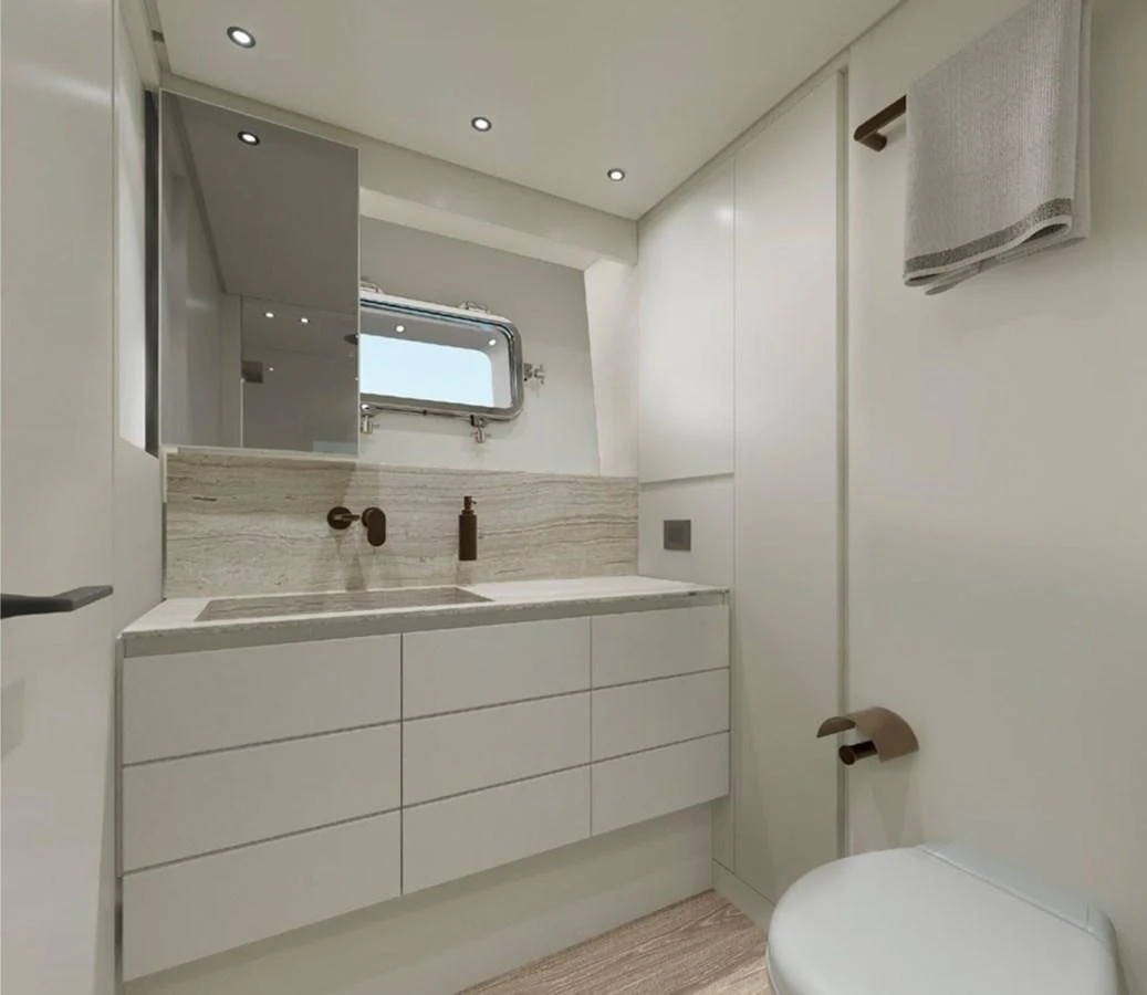 A modern and sleek bathroom with minimalist design and high-end fixtures. aboard SP92 Yacht for Sale