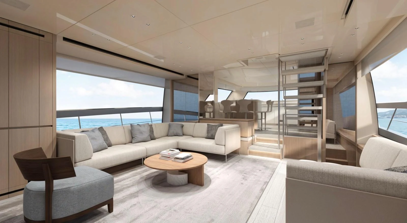 The spacious salon features elegant seating with panoramic ocean views. aboard SX76 Yacht for Sale