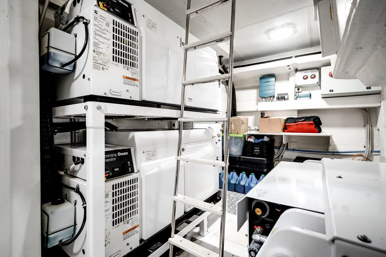 The engine room is equipped with advanced machinery and well-organized storage. aboard PARTNERSHIP V Yacht for Sale