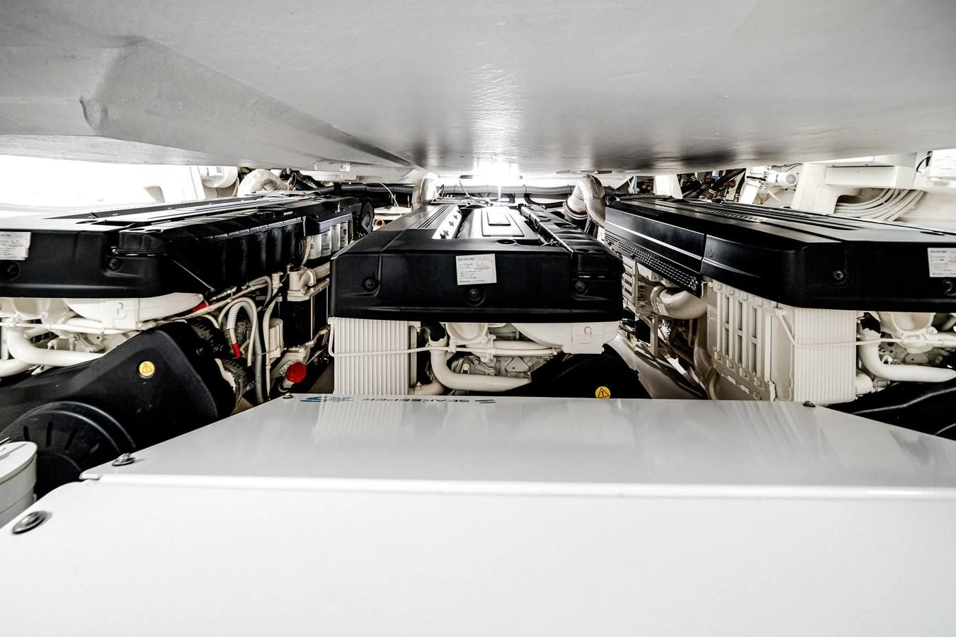 The image showcases the pristine engine room with well-maintained machinery. aboard PARTNERSHIP V Yacht for Sale