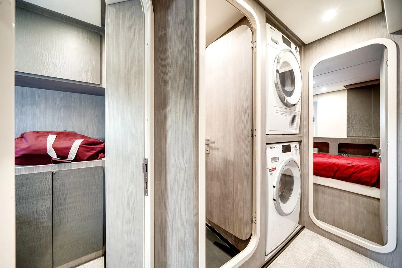 The yacht features a well-equipped laundry area with modern appliances and ample storage space. aboard PARTNERSHIP V Yacht for Sale