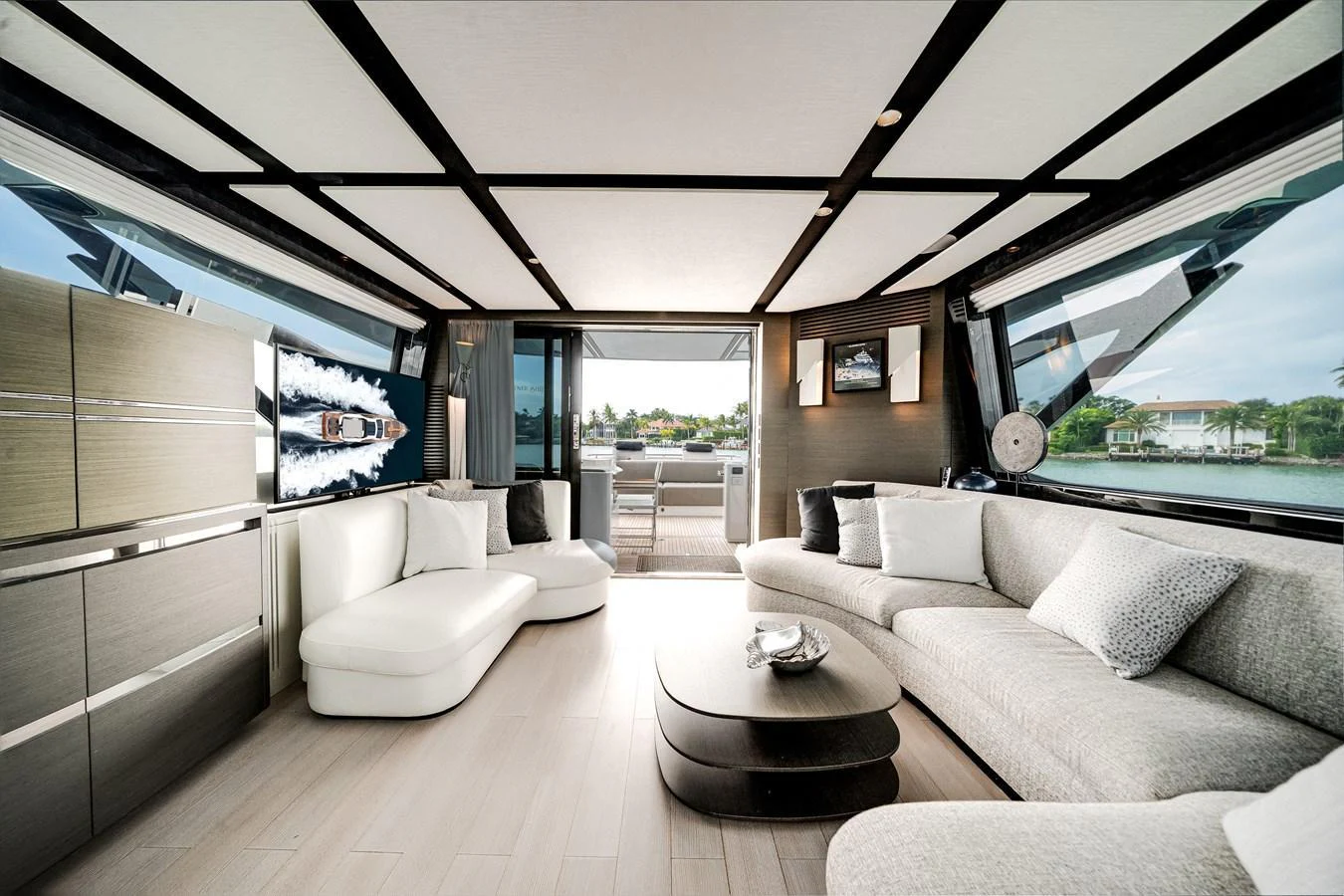 The salon offers a spacious and luxurious seating area with modern decor and ample natural light. aboard PARTNERSHIP V Yacht for Sale