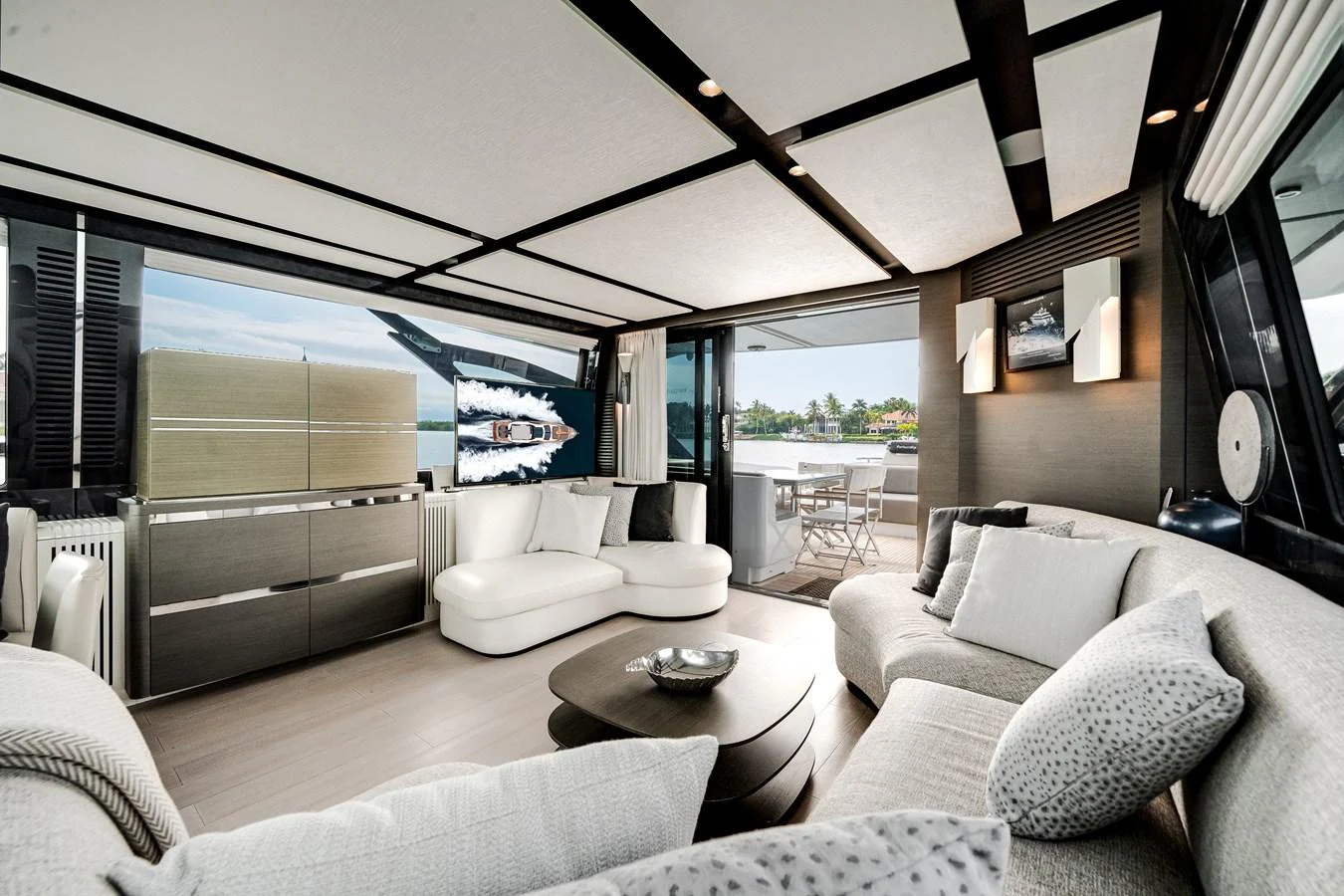The salon offers a spacious and luxurious seating area with modern decor and ample natural light. aboard PARTNERSHIP V Yacht for Sale