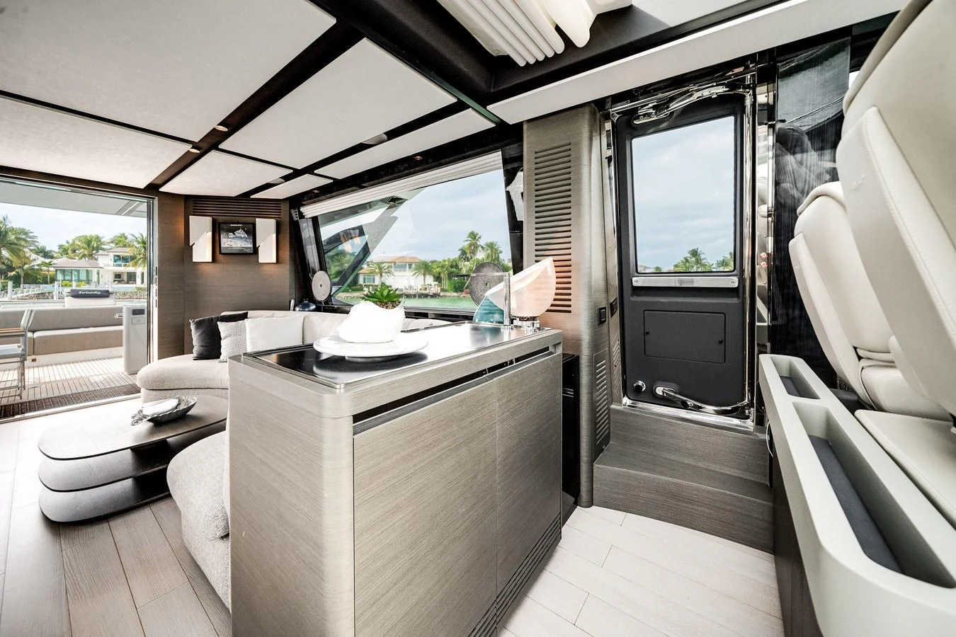 The modern interior of the yacht features sleek design elements and ample natural light. aboard PARTNERSHIP V Yacht for Sale