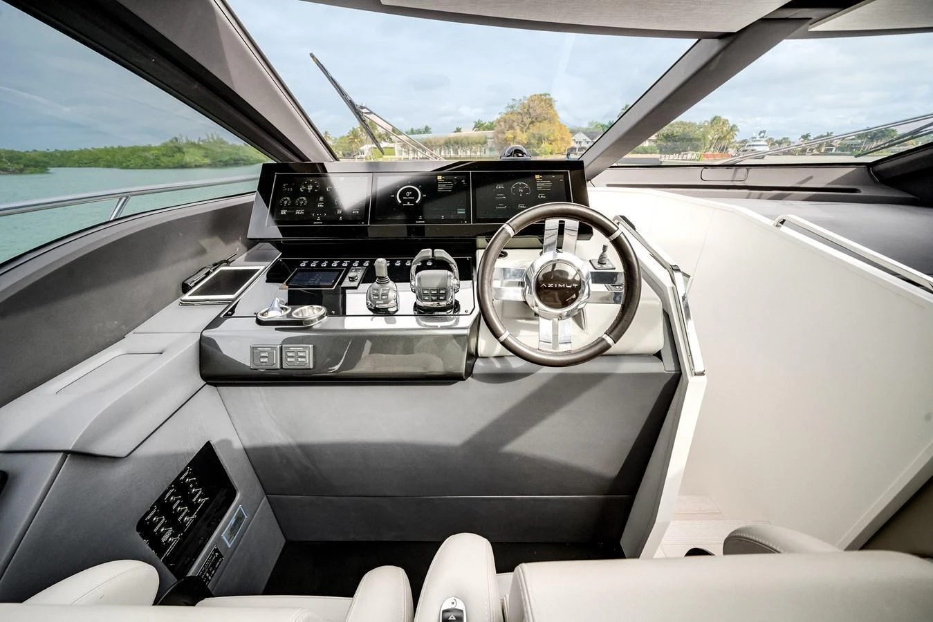 The helm station features advanced navigation equipment and a sleek, modern design. aboard PARTNERSHIP V Yacht for Sale