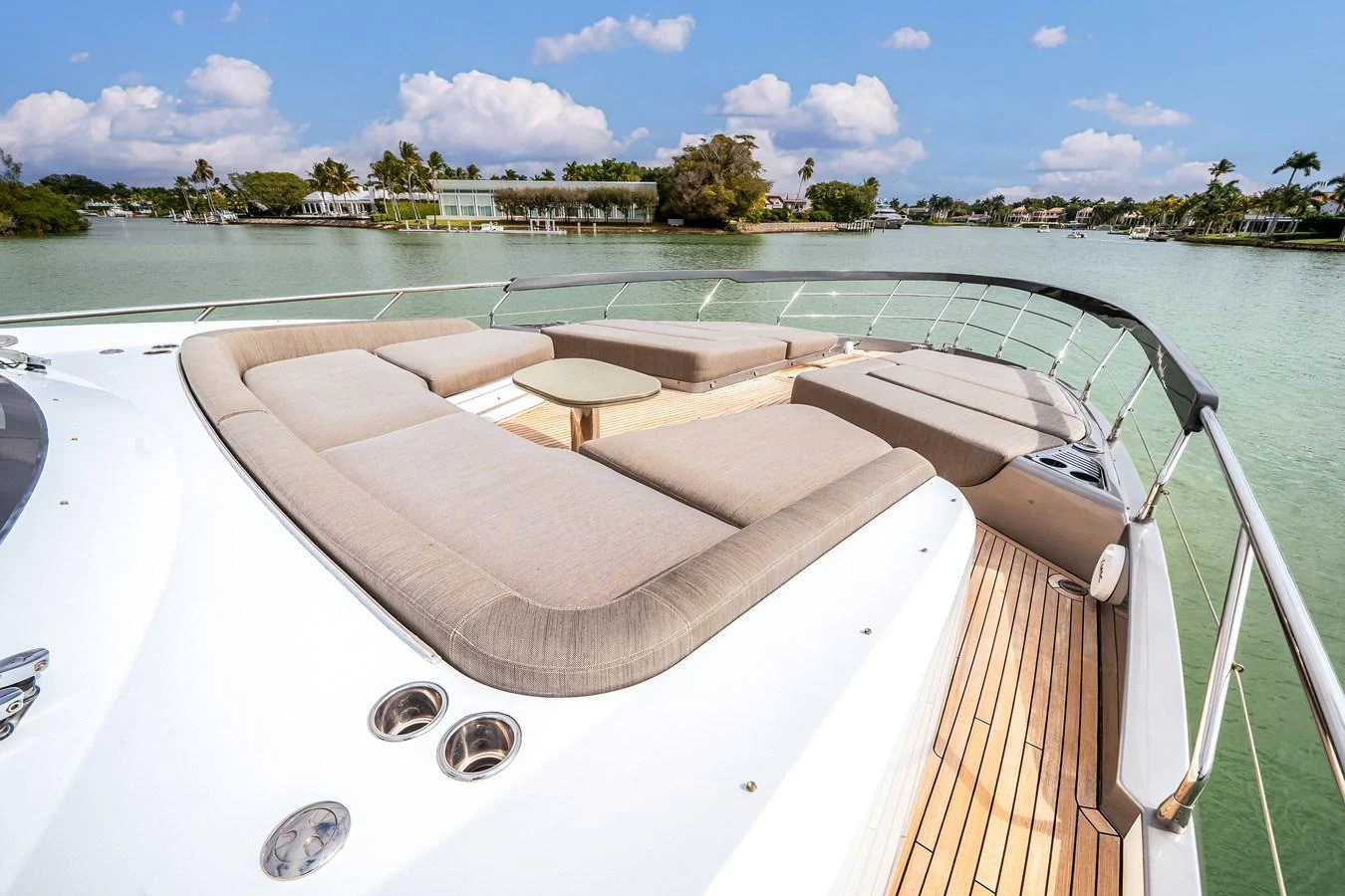 The foredeck features a spacious sunbathing area with plush cushions and scenic views. aboard PARTNERSHIP V Yacht for Sale