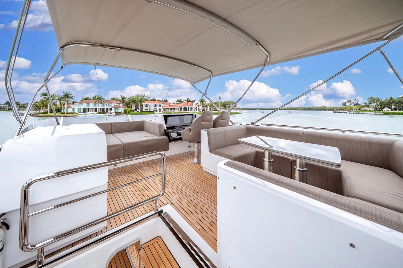 The flybridge offers a spacious and comfortable seating area with a stunning view of the surroundings. aboard PARTNERSHIP V Yacht for Sale