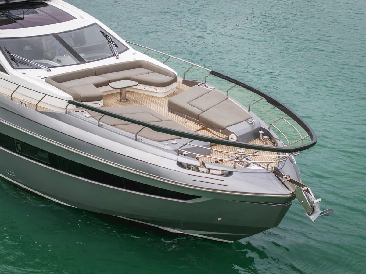 The yacht's foredeck features luxurious sun pads and a stylish seating area, perfect for relaxation. aboard PARTNERSHIP V Yacht for Sale