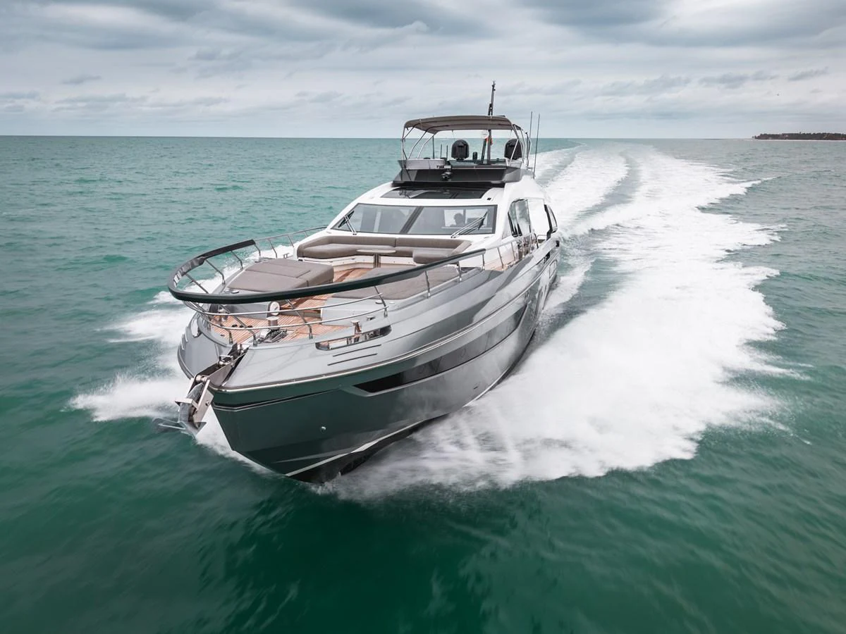 A sleek and modern yacht cruises swiftly through the open water, showcasing its elegant design and powerful performance. aboard PARTNERSHIP V Yacht for Sale