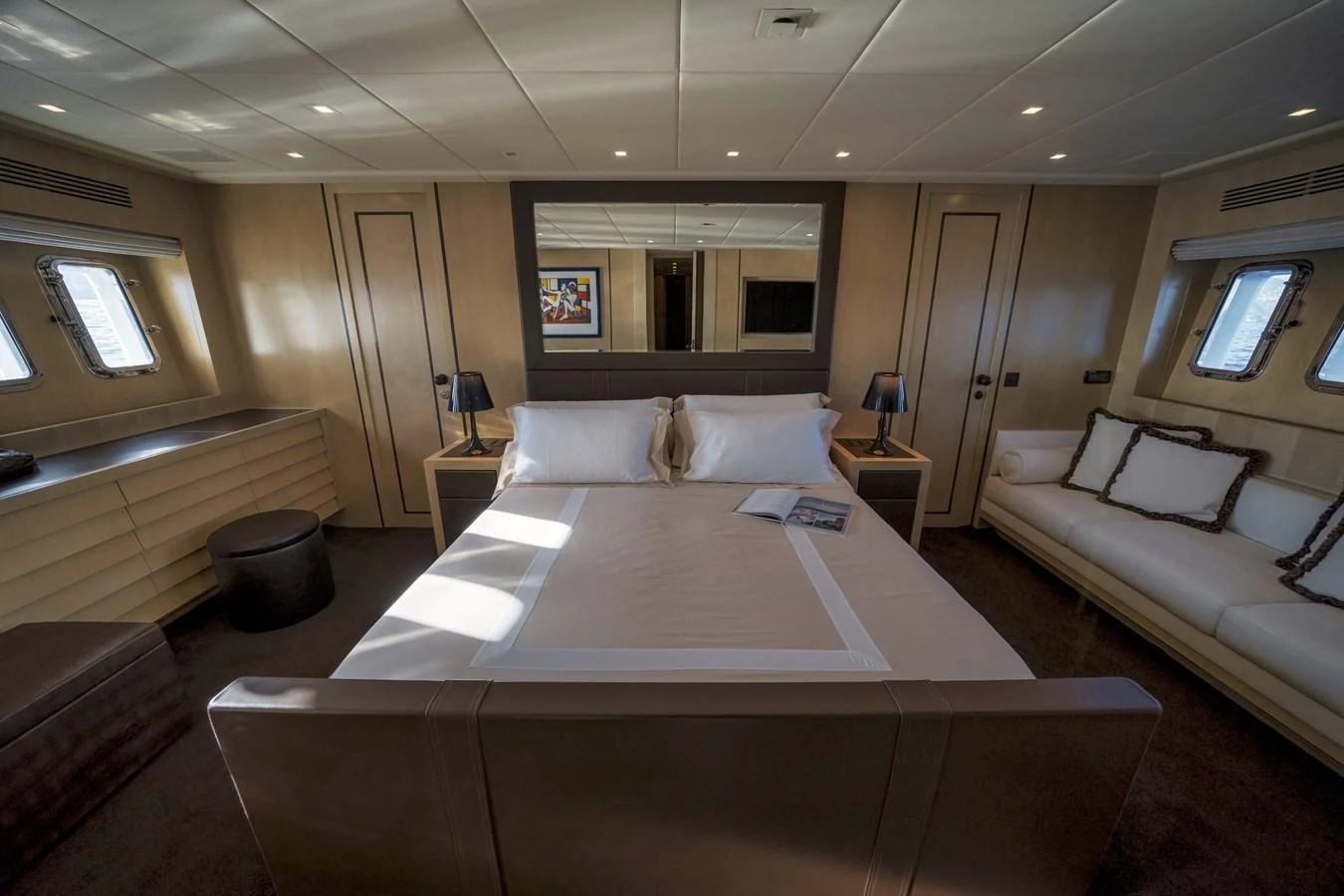The master stateroom offers a luxurious and spacious retreat with elegant furnishings and ample natural light. aboard MANU Yacht for Sale