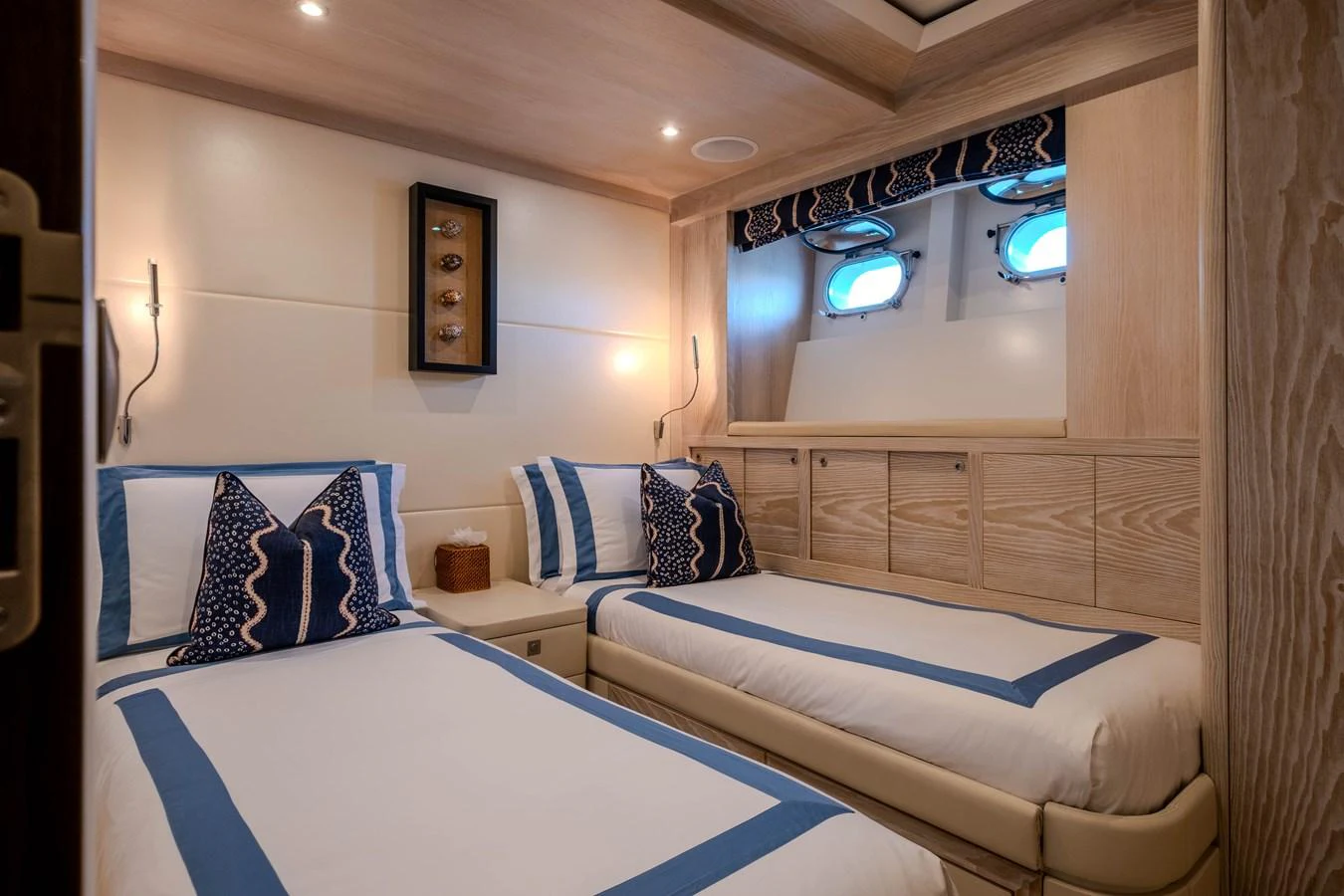 a room with two beds aboard MAHALO Yacht for Sale