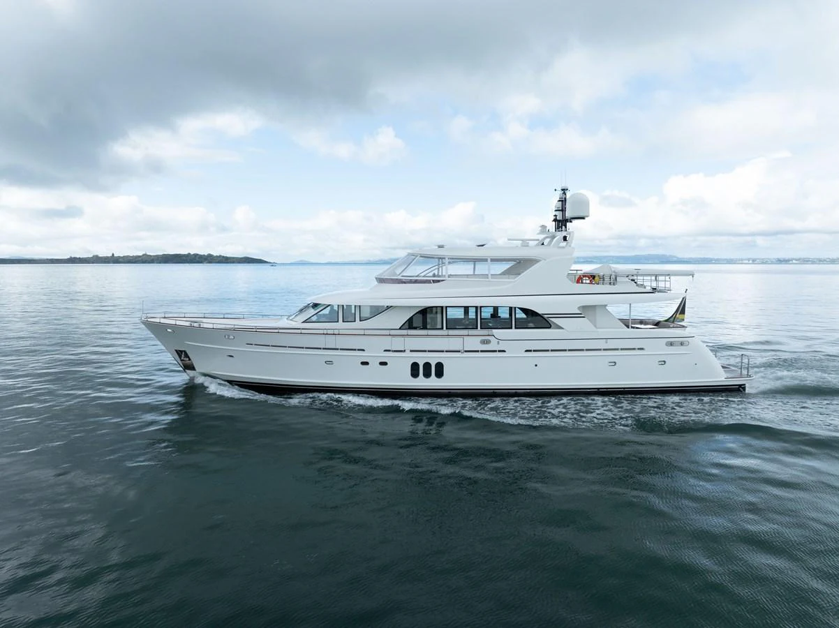 a white yacht in the water aboard MAHALO Yacht for Sale