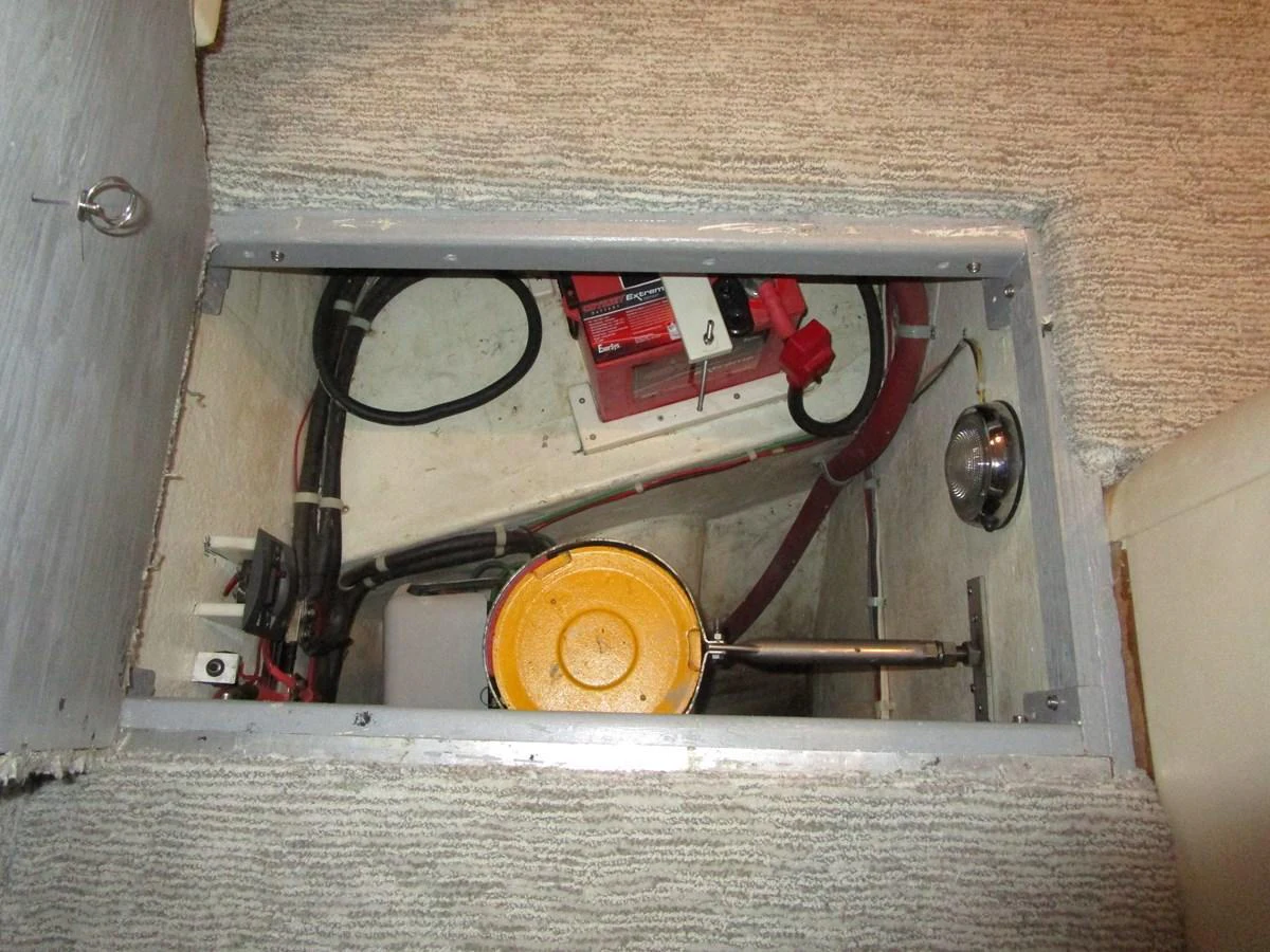 A view of the yacht's engine compartment accessed through a hatch in the floor. aboard SHORE GIRL Yacht for Sale