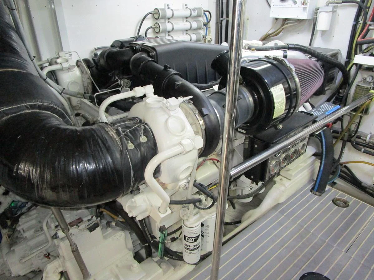The image showcases the yacht's engine room with detailed machinery and equipment. aboard SHORE GIRL Yacht for Sale
