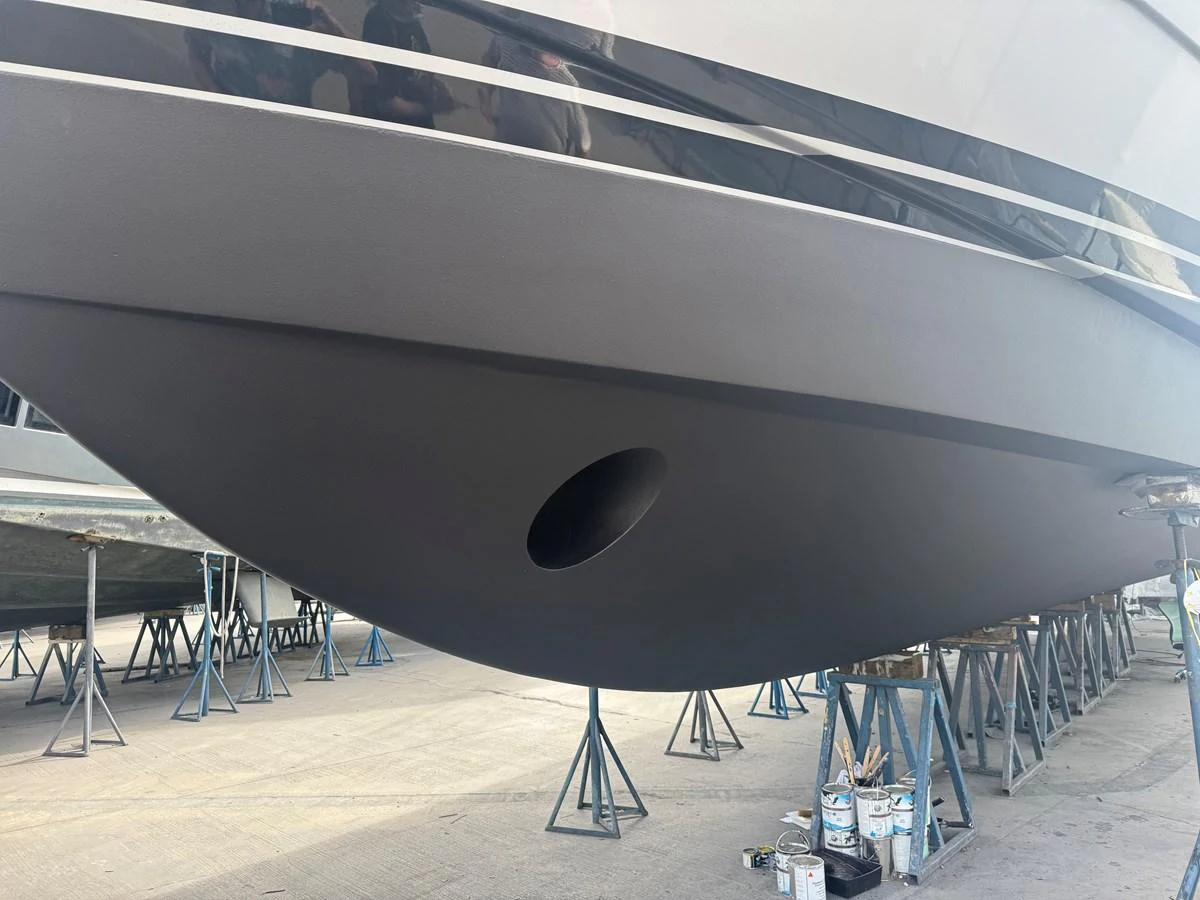 A close-up view of the yacht's hull, showcasing its sleek design and craftsmanship. aboard SHORE GIRL Yacht for Sale