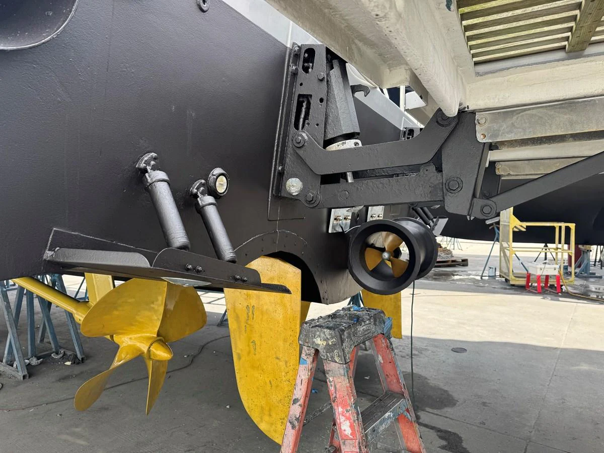 A close-up view of the yacht's propulsion system and rudder, showcasing the intricate engineering. aboard SHORE GIRL Yacht for Sale
