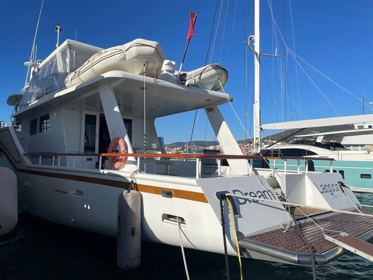 The yacht's aft deck is showcased, featuring a spacious layout with a tender mounted on top. aboard ATB MAROC  CUSTOM MOTOR YACHT Yacht for Sale