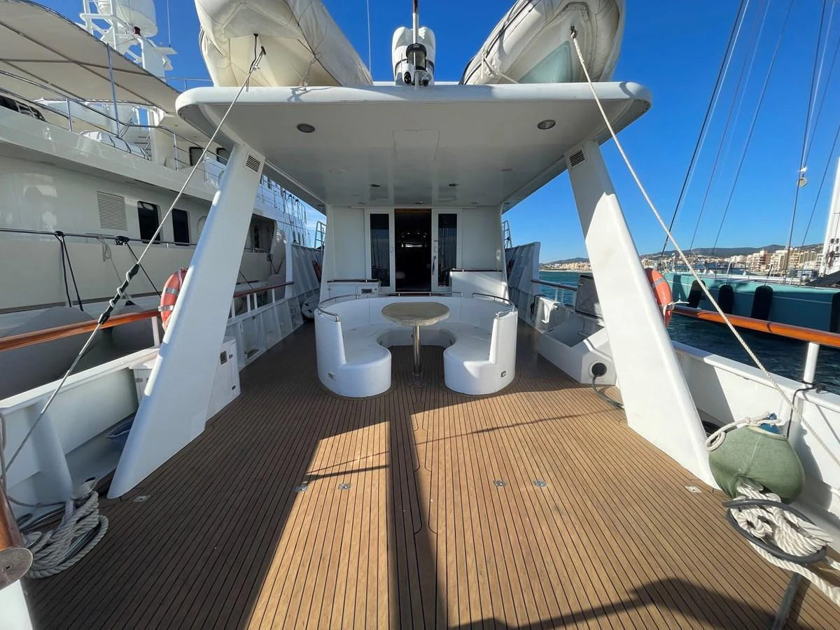 The aft deck features a spacious seating area with a central table, ideal for outdoor relaxation and dining. aboard ATB MAROC  CUSTOM MOTOR YACHT Yacht for Sale