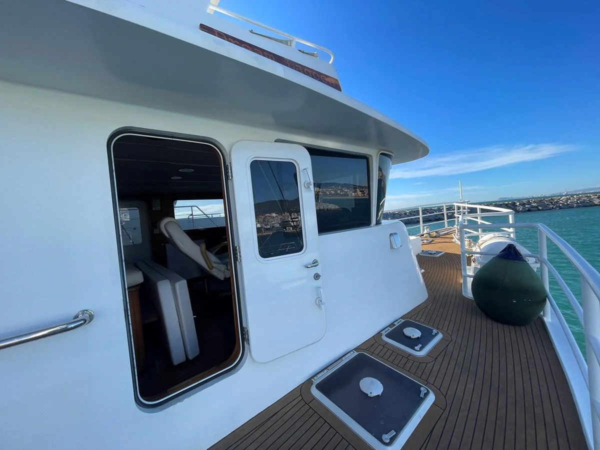 The side deck of the yacht features a sleek design with easy access to the interior. aboard ATB MAROC  CUSTOM MOTOR YACHT Yacht for Sale