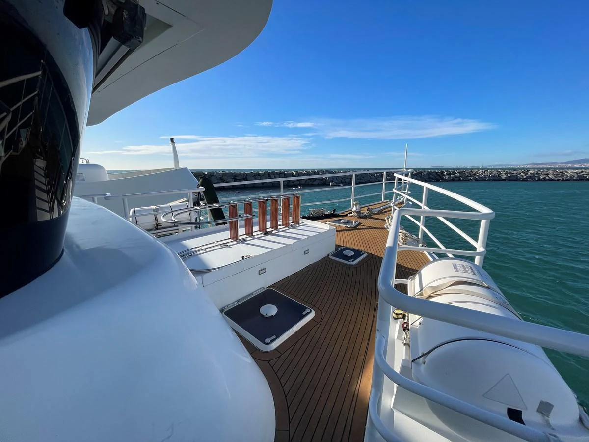 The yacht's deck offers a spacious and inviting area with a beautiful view of the water. aboard ATB MAROC  CUSTOM MOTOR YACHT Yacht for Sale
