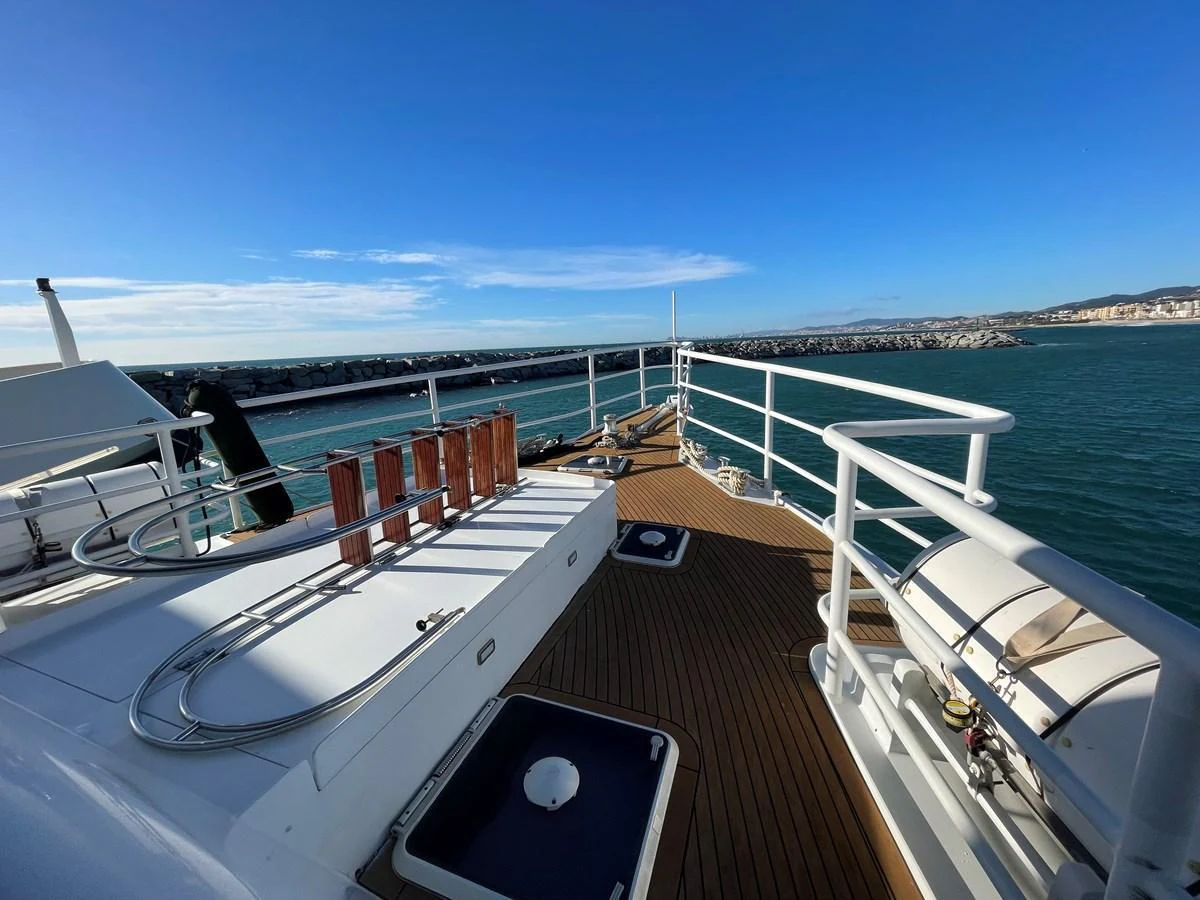 The yacht's deck offers a spacious and inviting area with stunning views of the sea and coastline. aboard ATB MAROC  CUSTOM MOTOR YACHT Yacht for Sale