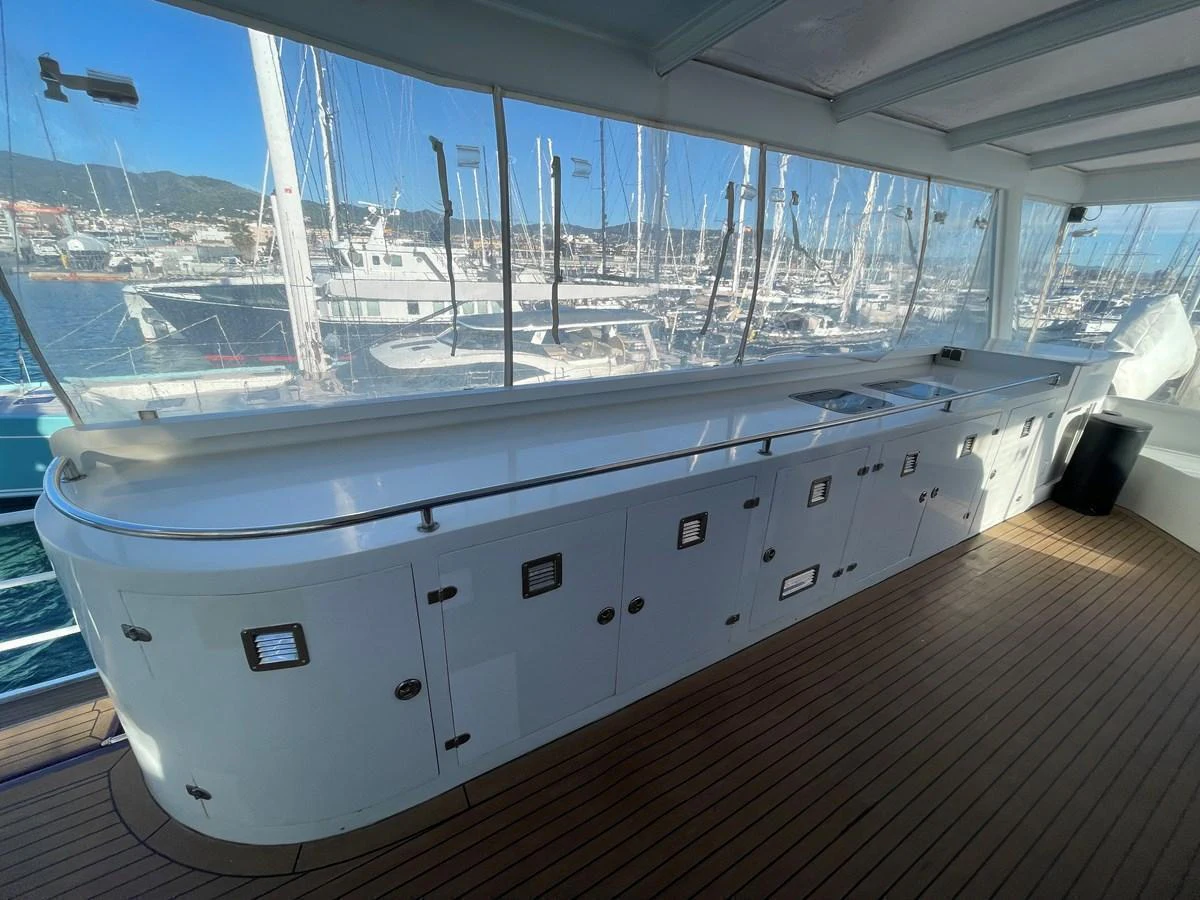 The yacht features a spacious outdoor galley with ample counter space and storage, perfect for alfresco dining and entertaining. aboard ATB MAROC  CUSTOM MOTOR YACHT Yacht for Sale