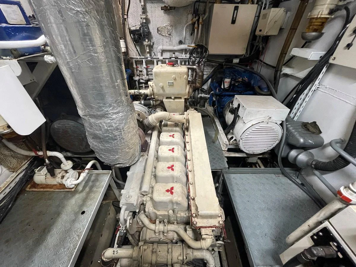 The image showcases the engine room with visible machinery and equipment. aboard ATB MAROC  CUSTOM MOTOR YACHT Yacht for Sale
