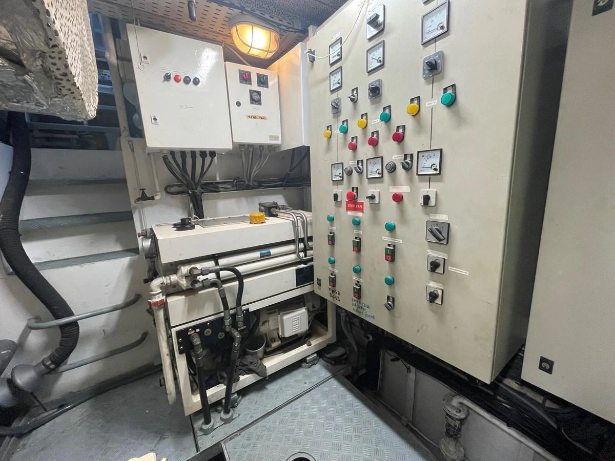 The image showcases the yacht's well-maintained engine room with control panels and machinery. aboard ATB MAROC  CUSTOM MOTOR YACHT Yacht for Sale