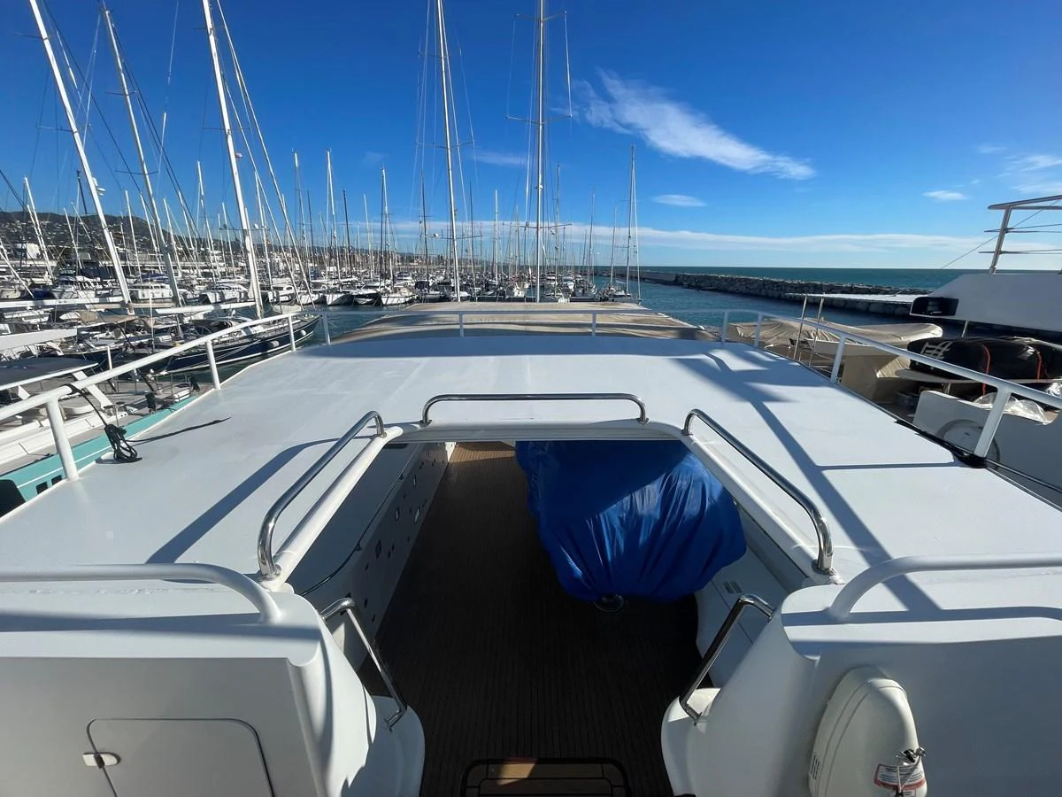 The flybridge offers a spacious and open area with a view of the marina and surrounding yachts. aboard ATB MAROC  CUSTOM MOTOR YACHT Yacht for Sale