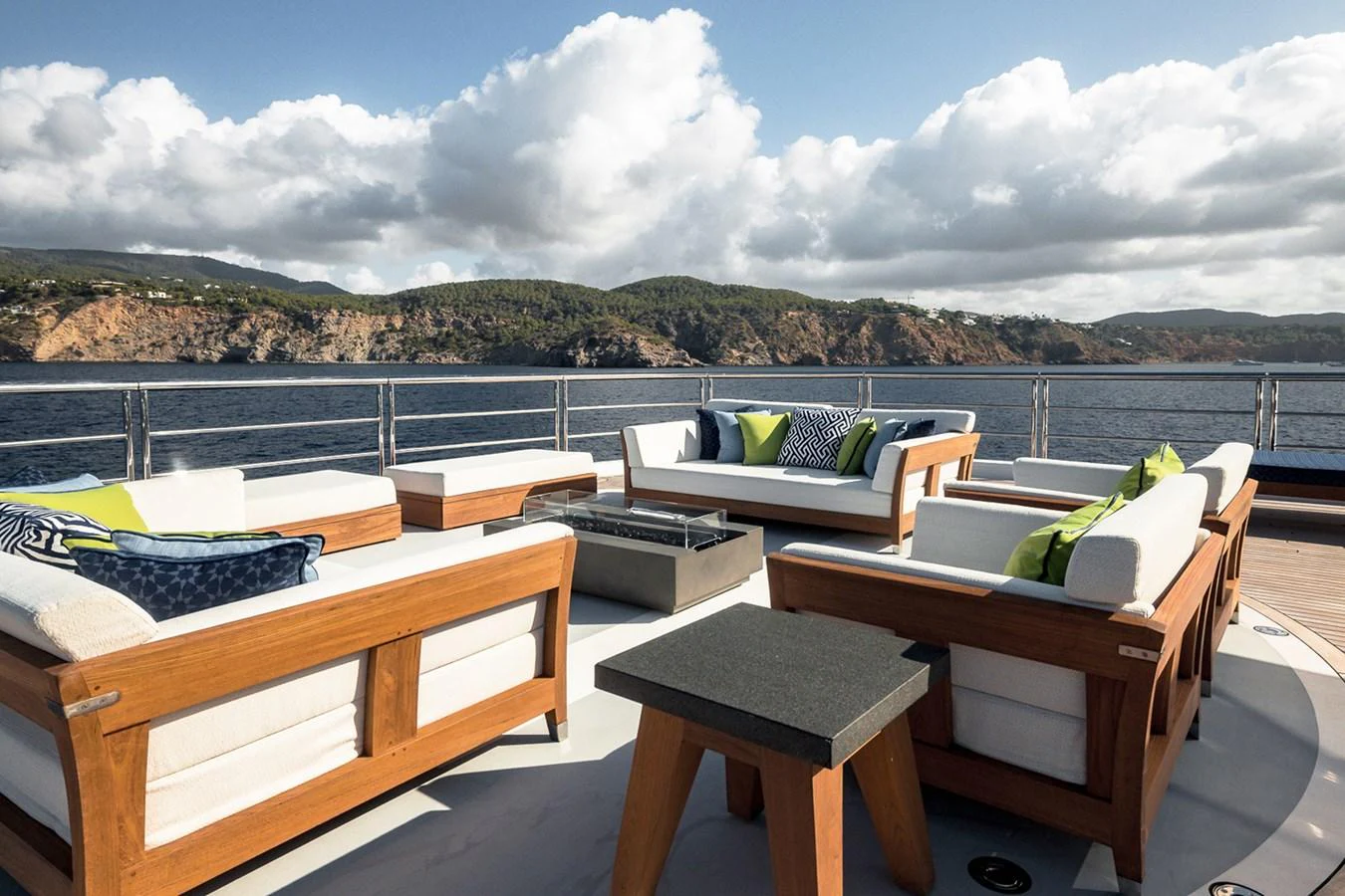 a room with tables and chairs aboard ROCINANTE Yacht for Sale