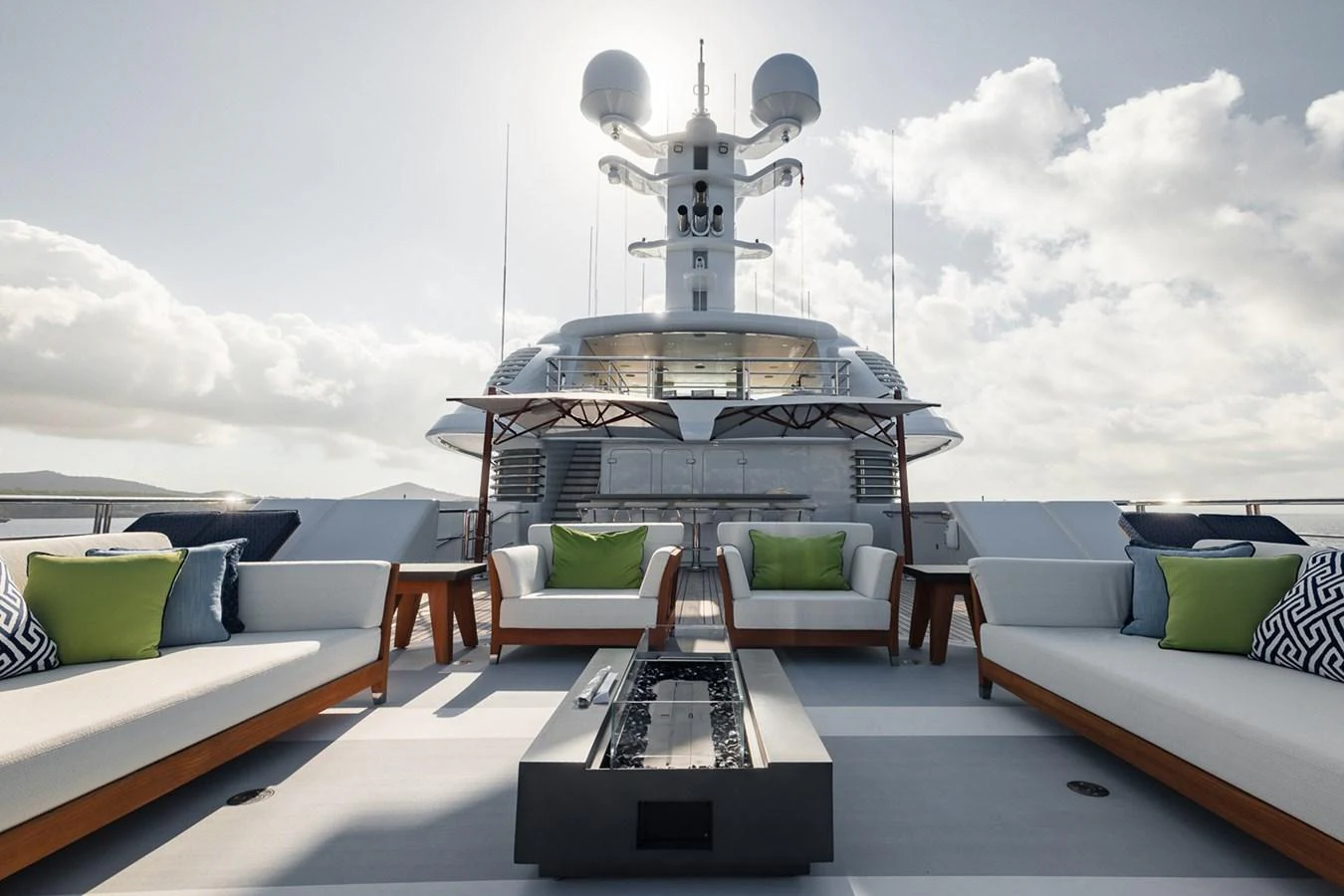 a room with a table chairs and a large white building with a dome on top aboard ROCINANTE Yacht for Sale