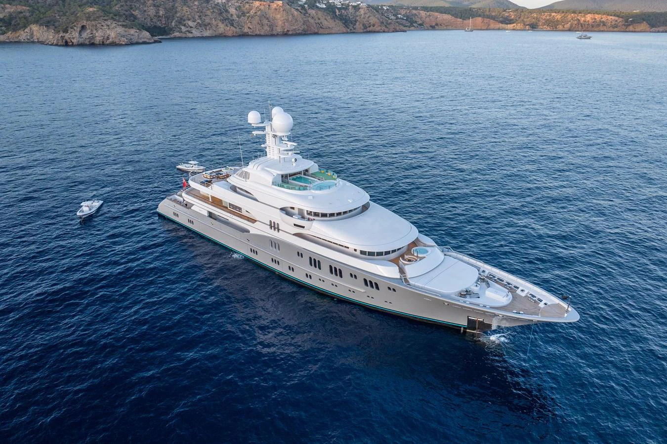 a white boat in the water aboard ROCINANTE Yacht for Sale
