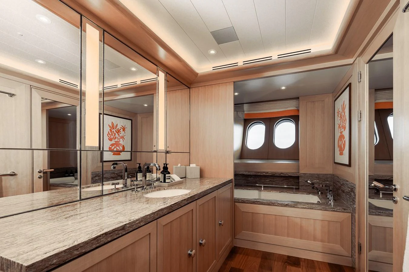 a large bathroom with marble counters aboard ROCINANTE Yacht for Sale