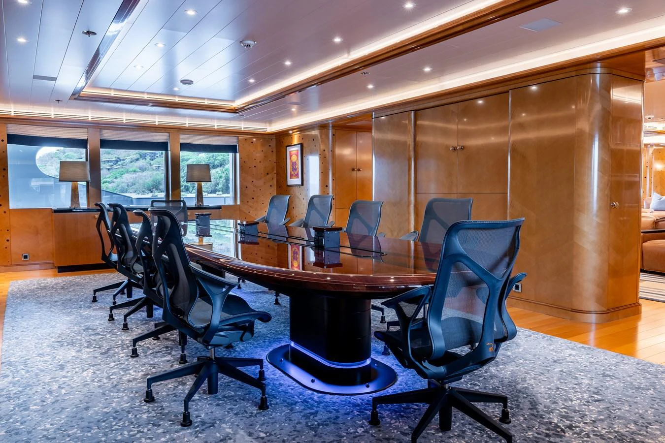 a round table with chairs around it aboard ROCINANTE Yacht for Sale