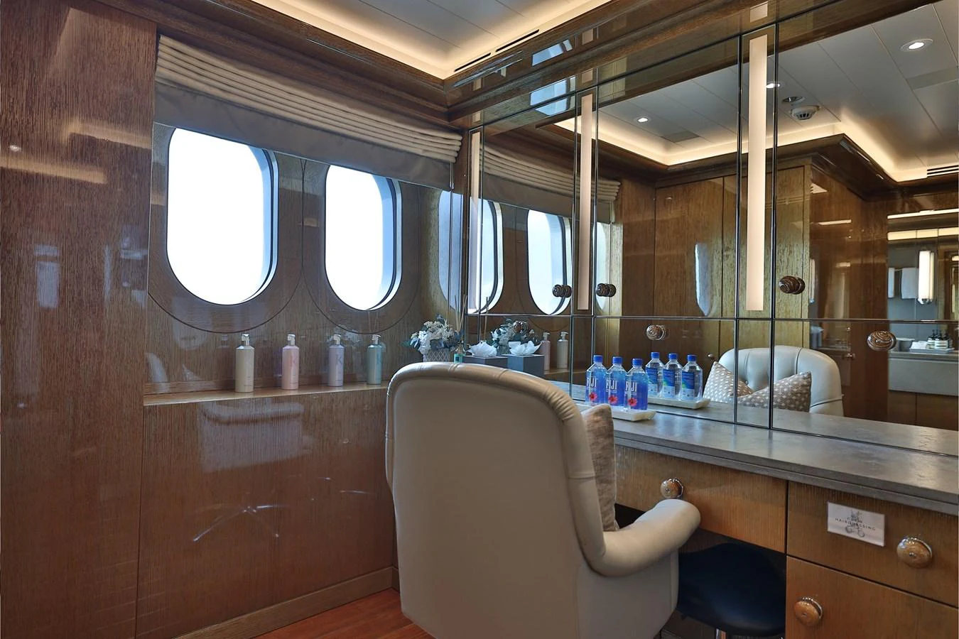 a bathroom with a large mirror aboard ROCINANTE Yacht for Sale