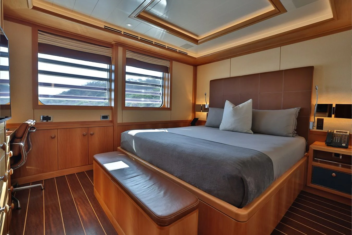 a bed in a room aboard ROCINANTE Yacht for Sale