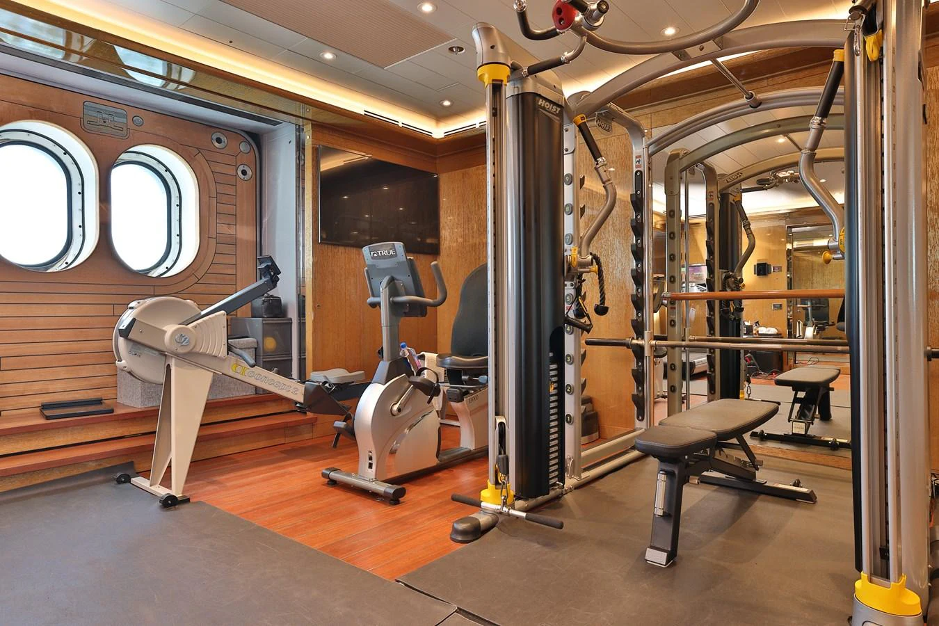 a gym with equipment aboard ROCINANTE Yacht for Sale