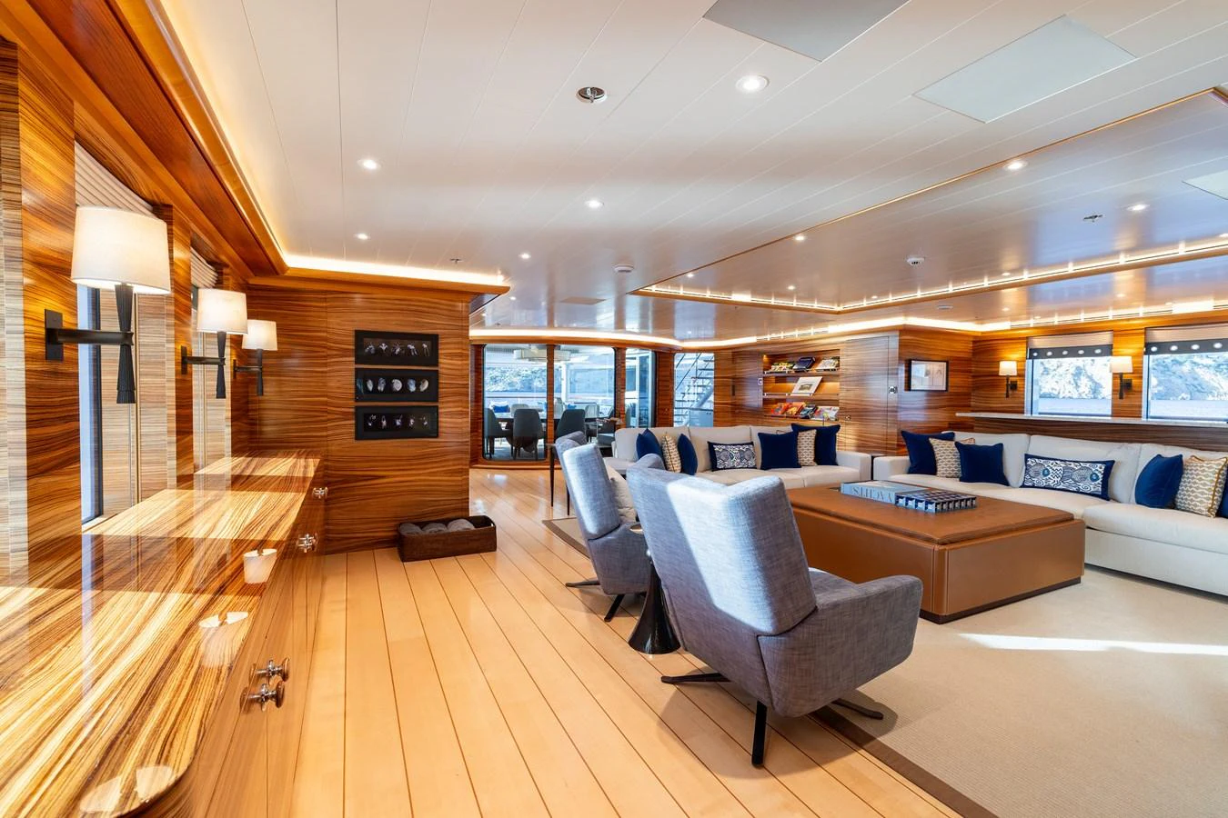 a living room with wood floors aboard ROCINANTE Yacht for Sale