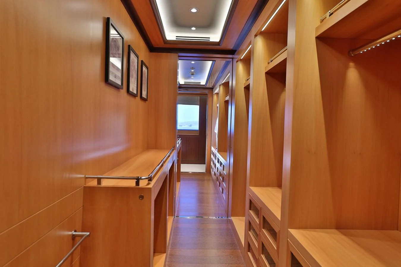 a hallway with a table and chairs aboard ROCINANTE Yacht for Sale